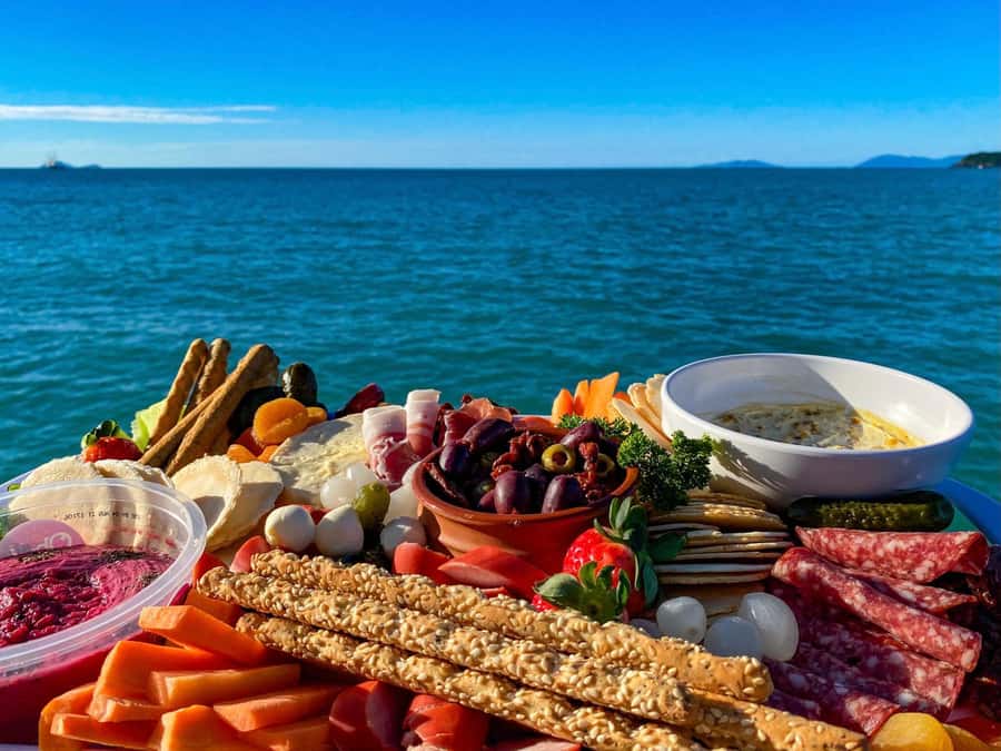 Airlie Beach: BYOB Sunset Sail in Style Catamaran Cruise - Antipasto on the main deck
