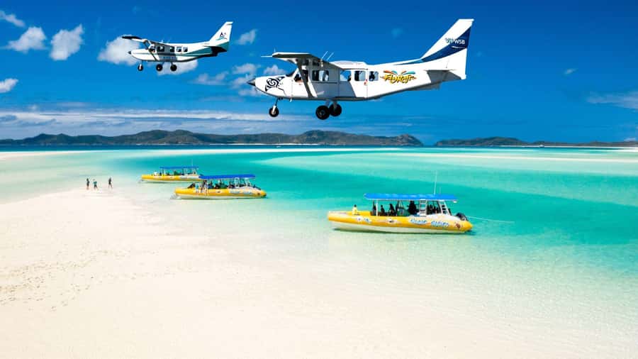 Airlie Beach: Fly Raft Package w Scenic Flight & Snorkeling - From short coach transfer to high-speed raft