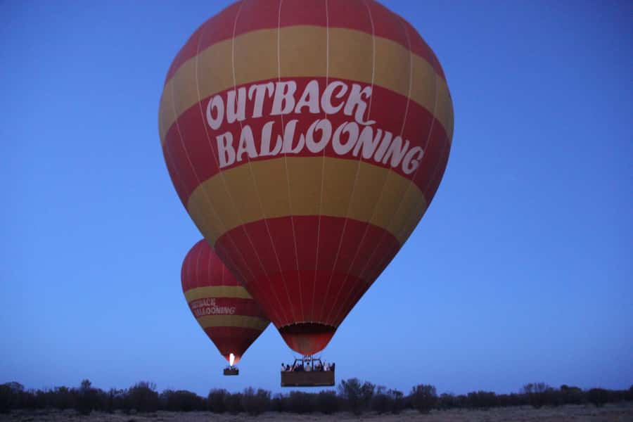 Alice Springs: Early Morning Hot Air Balloon Flight - Landing and helping with the balloon