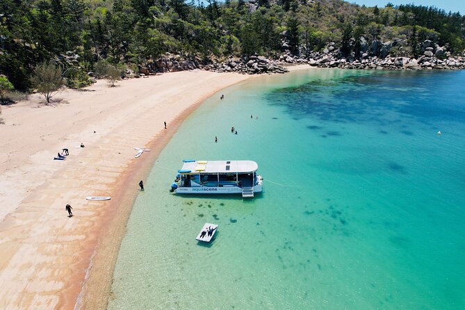 Aquascene Circumnavigation Magnetic Island Tour - A beach stop and time on a paddleboard