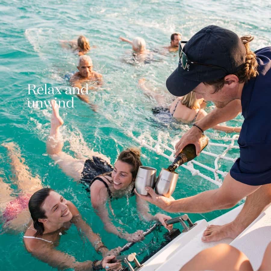 Broome's Iconic Catamaran Sunset Cruise - Walking across Cable Beach to the tender