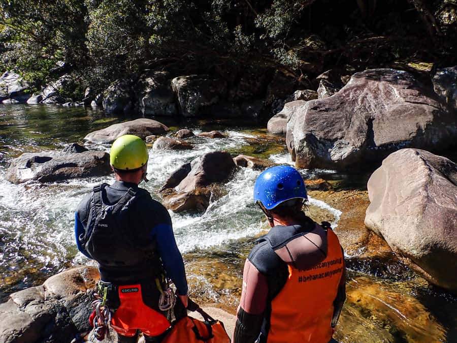 Cairns: Behana Gorge Rainforest Canyoning Tour - Rock jumps, slides, and natural chutes