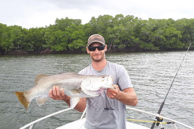 Cairns Estuary Fishing - Boarding the 19-foot River Rocket at Marlin Marina