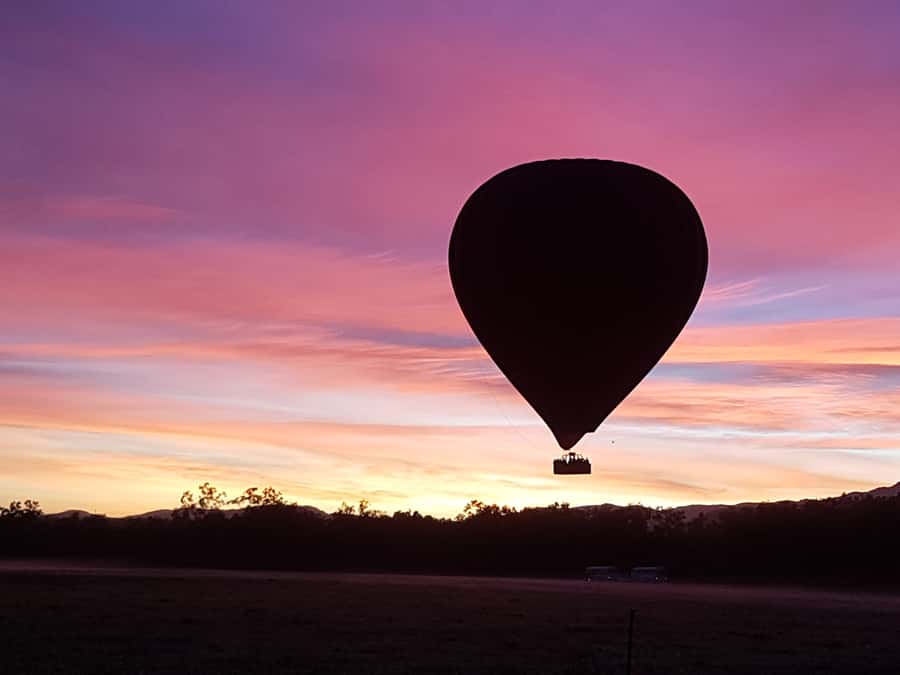 Cairns: Hot Air Balloon Flight with Transfers - Booking, cancellation, and language details