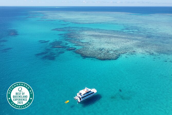 Cairns: Small Group | Outer Reef Snorkel & Dunk Island - Boarding the two-deck catamaran at Mission Beach