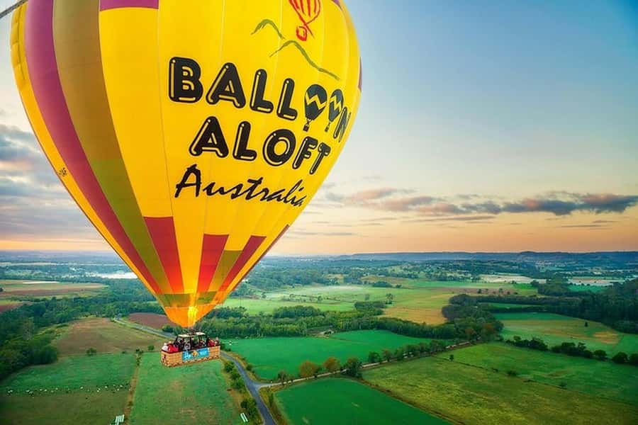 Camden Valley: Sunrise Hot Air Balloon Flight With Breakfast - Watching a colourful balloon come to life