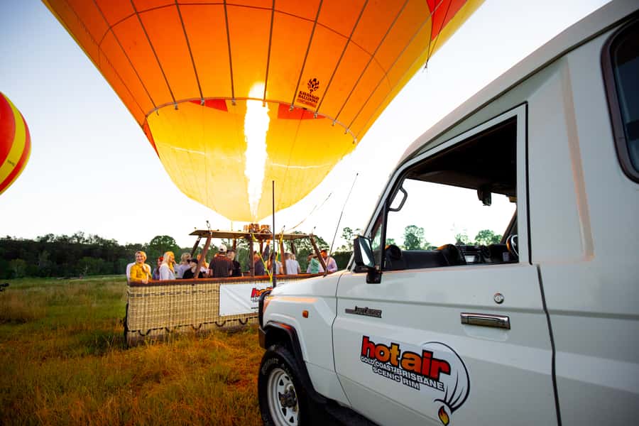 Gold Coast: Hot Air Balloon Flight and Vineyard Breakfast - Before sunrise at the launch site