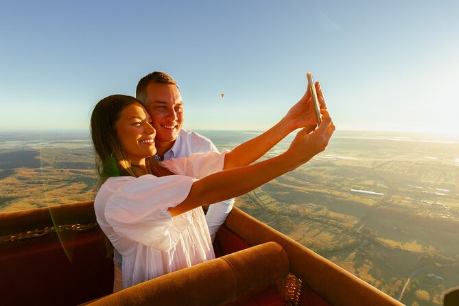 Gold Coast Hot Air Balloon + Winery Breakfast + Return Transfers - Helping to pack the balloon after landing