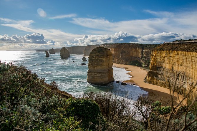 Great Ocean Road 12 Apostles & Rainforest Walk with Morning Tea - Memorial Arch and the road built by returned soldiers