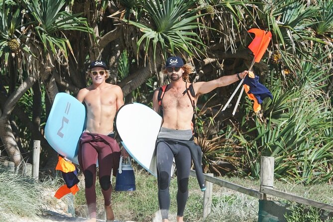 Half Day Guided Surf Lesson in Byron Bay - Learning the basics before entering the water