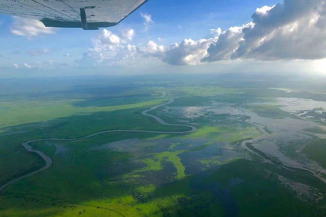 Kakadu National Park Scenic Flight &Yellow Water Cruise - Weather, seasons, and changing views