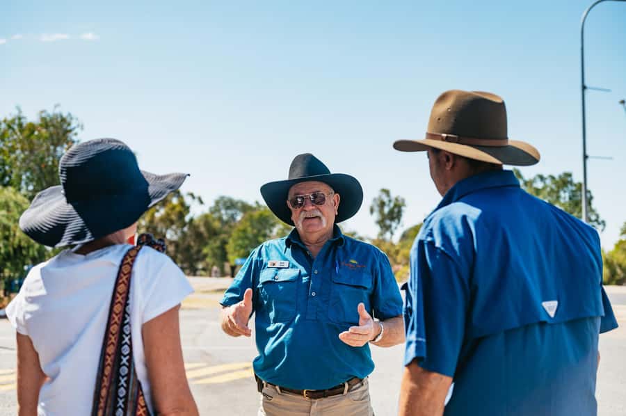 Longreach History and Town Tour - Meeting the bus beside the big red chair