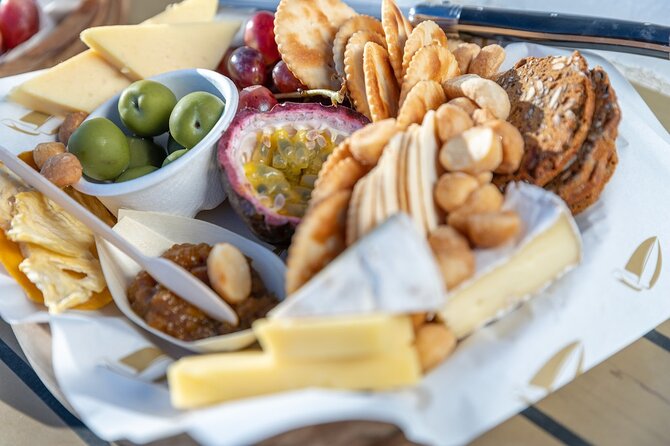 Magnetic Island Sip and Sail Sunset Cruise - Local cheese, pumpkin chutney, and a useful drinks package