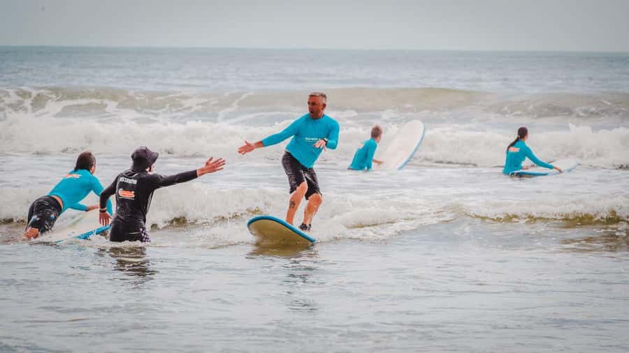 Noosa Heads: 2 Hour Surf Experience on the Sunshine Coast - Moving into waist-deep water for the first attempts