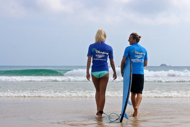 Small-Group Surfing Lessons in Byron Bay - Getting suited up and meeting the instructor