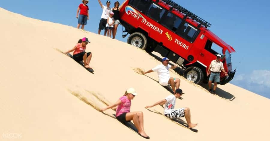 Sydney: Port Stephens Dolphin Cruise & Sandboarding Day Trip - Sandboarding at Anna Bay and the Stockton dunes