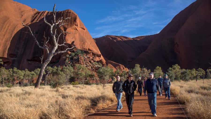 Uluru: Guided Trek of Uluru's Base in a Small Group - Sunrise at Uluru, before the heat arrives