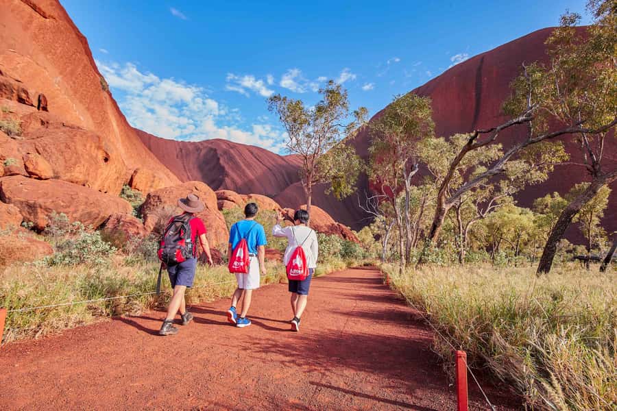 Uluru: Sacred Sites & Sunset Tour with Wine & Cheeseboard - The base drive puts Uluru in context