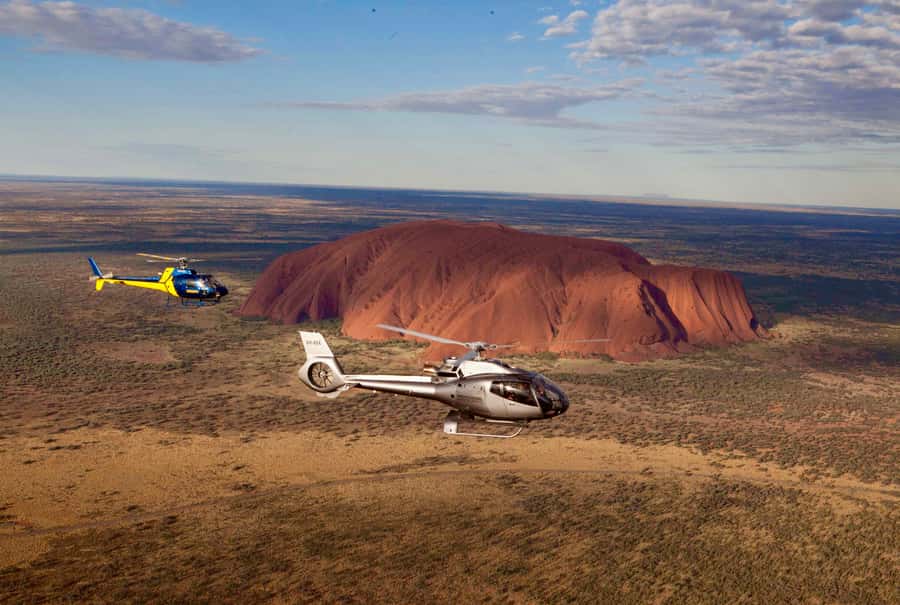 Yulara: Uluru and Kata Tjuta Sunset Helicopter Tour - The hotel pickup and airport briefing